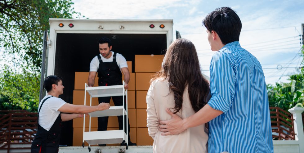 asian couple check while unloading boxes and furni 2025 02 10 00 35 02 utc - Antalya Evden Eve Nakliyat